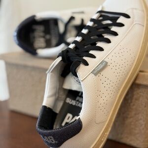 P448 John Sneakers- Black Lionfish - size 7 
Brand new!